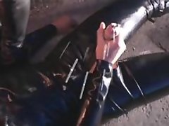 Mistress in latex spanks poor slave